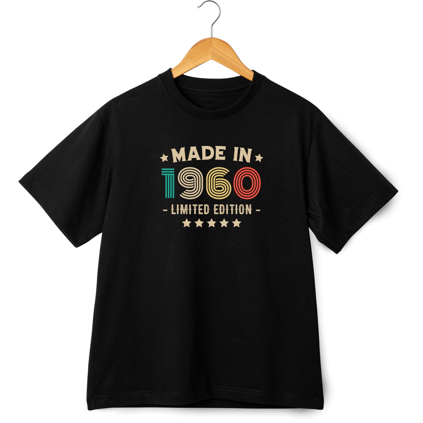 Black t-shirt with 'Made in 1960' text on a hanger against a white background