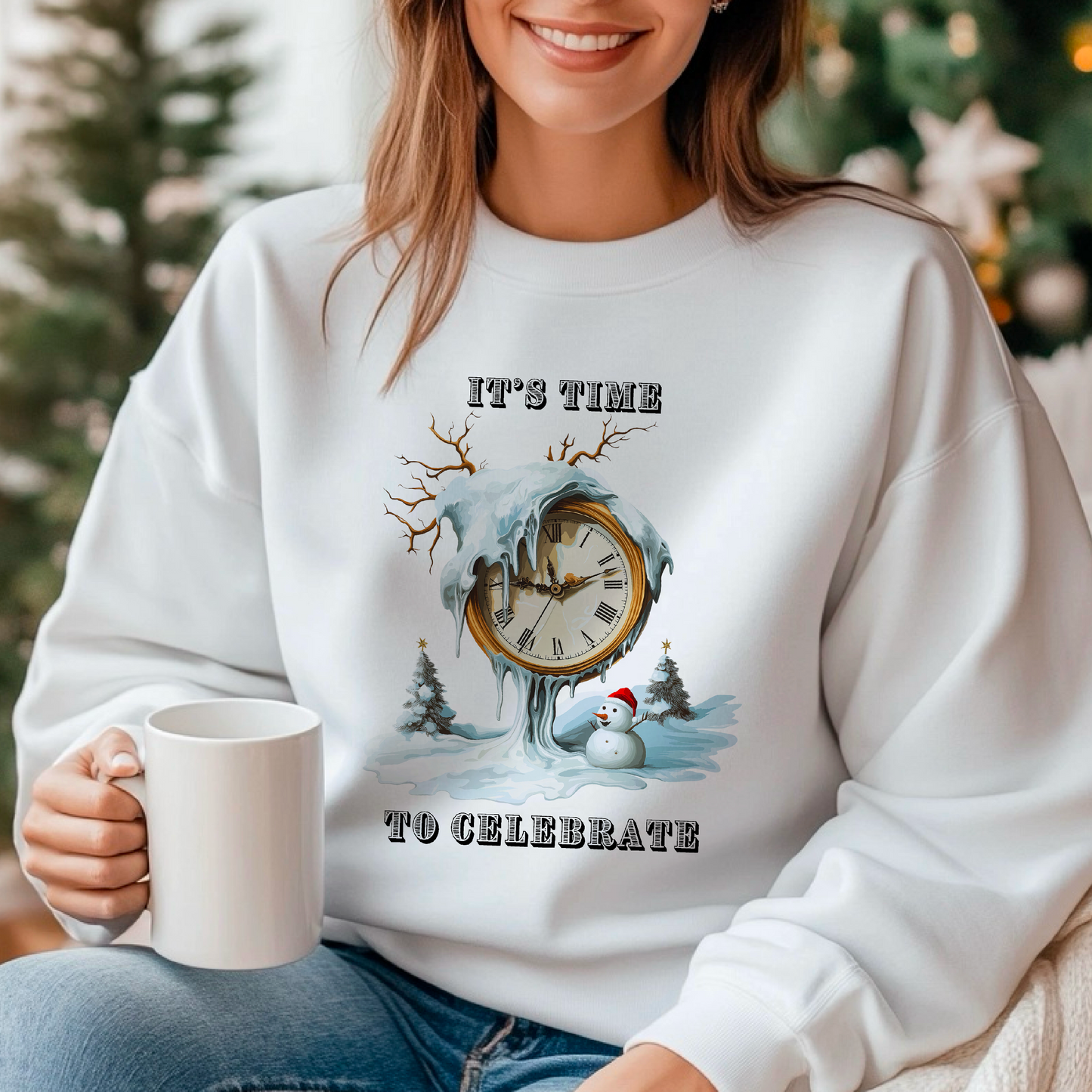 A woman sitting wearing a white crewneck sweatshirt with a Christmas-themed design, including a melted clock and text 'It’s time to celebrate'.