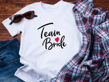 Team Bride Shirt – Festive Wedding Party T-Shirt – Bachelorette Party Tee – Matching Bridal Squad Shirts – Bride Tribe Gift Idea