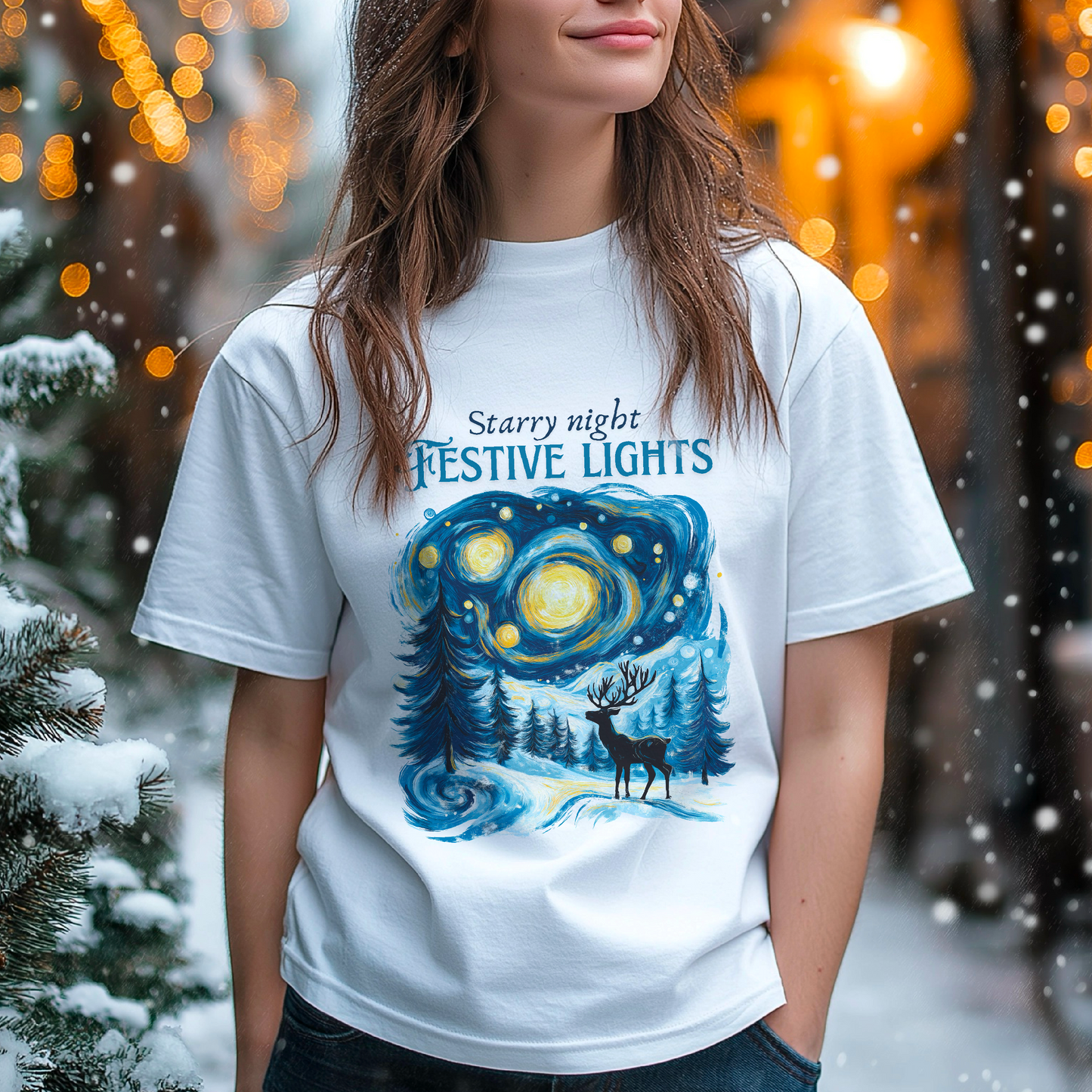 Person wearing a white t-shirt with a festive lights design in a snowy outdoor setting
